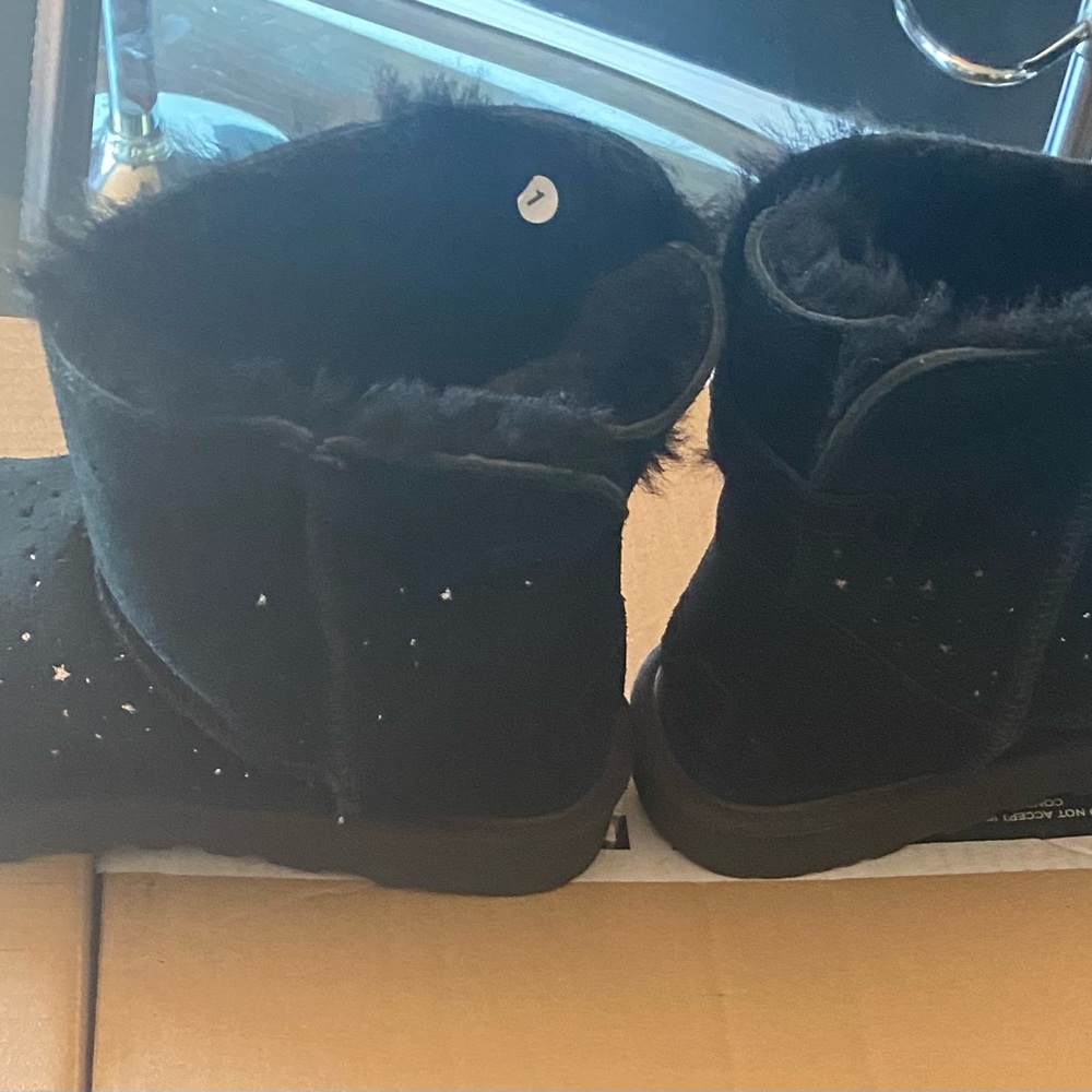 Gently used Ugg black booties is good condition size 10 U.S.A.